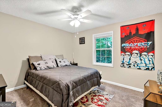 bedroom featuring carpet floors, a textured ceiling, baseboards, and ceiling fan