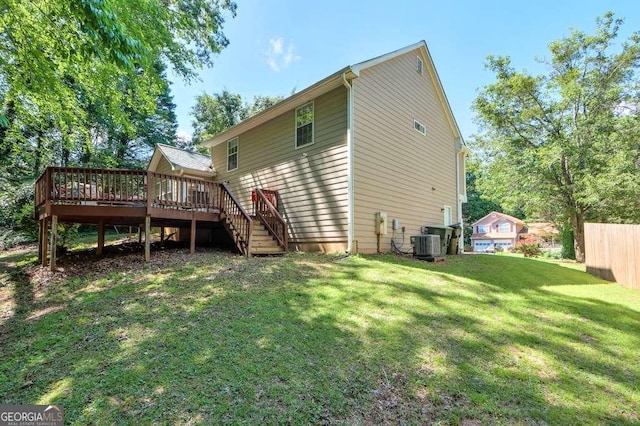 back of property featuring a wooden deck, stairway, and central AC unit