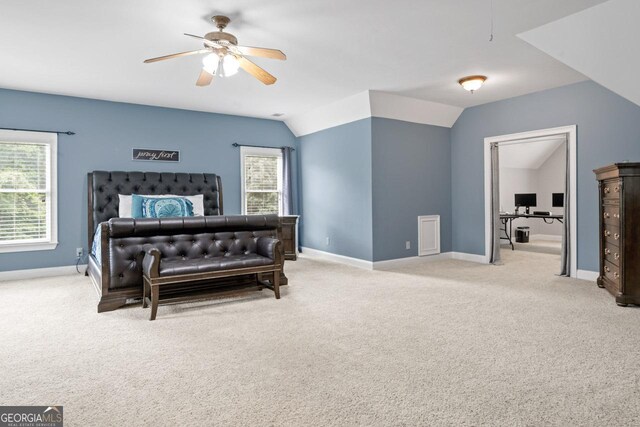 510 Jenna Trl, Mcdonough, GA 30252 - bedroom with light colored carpet, lofted ceiling, baseboards, a ceiling fan, and an office area