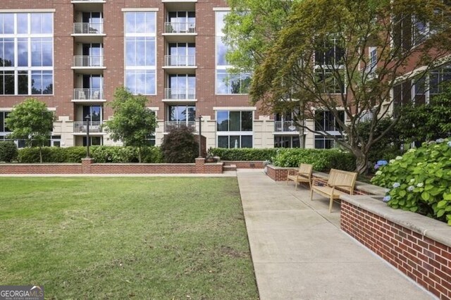1820 Peachtree St Unit 311, Atlanta, GA 30309 - view of home's community with a lawn