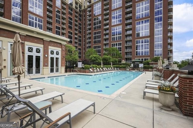 1820 Peachtree St Unit 311, Atlanta, GA 30309 - community pool with a patio area