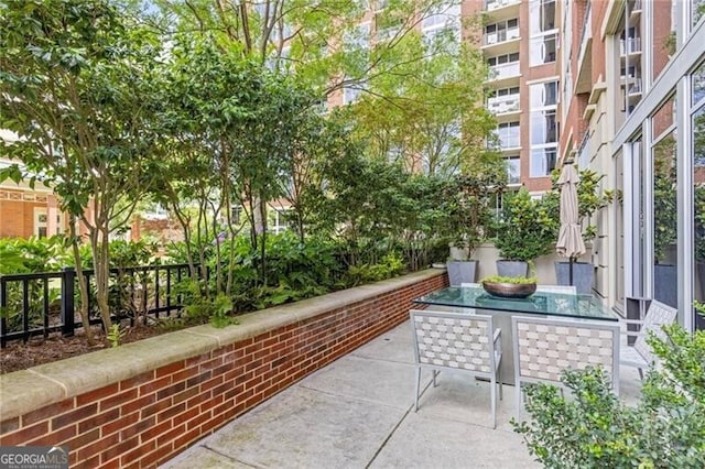 1820 Peachtree St Unit 311, Atlanta, GA 30309 - view of patio featuring outdoor dining area