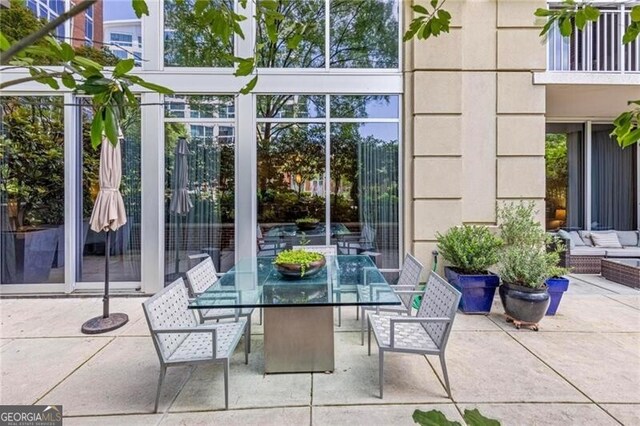 1820 Peachtree St Unit 311, Atlanta, GA 30309 - view of patio with outdoor dining space