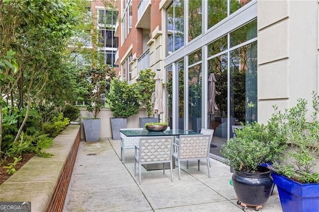1820 Peachtree St Unit 311, Atlanta, GA 30309 - view of patio featuring outdoor dining space