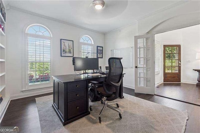 office with ornamental molding, french doors, dark wood-style floors, baseboards, and ceiling fan