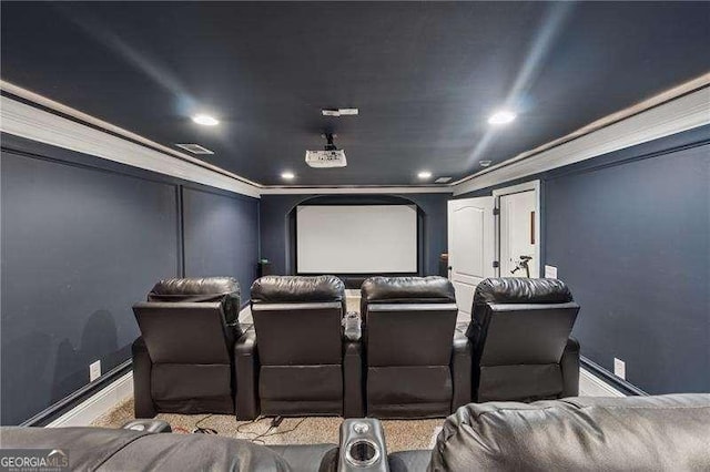 cinema with baseboards, carpet flooring, recessed lighting, crown molding, and arched walkways