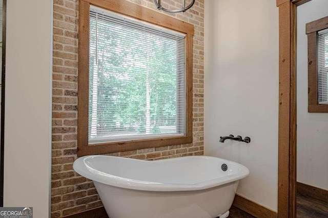 full bath with a freestanding bath