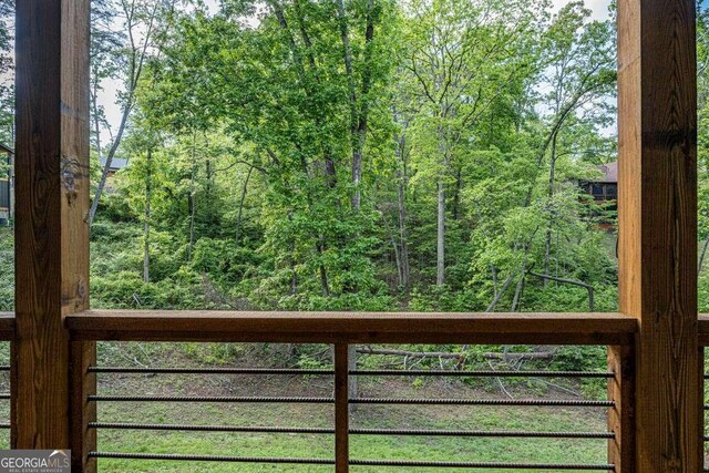 view of yard with a wooded view