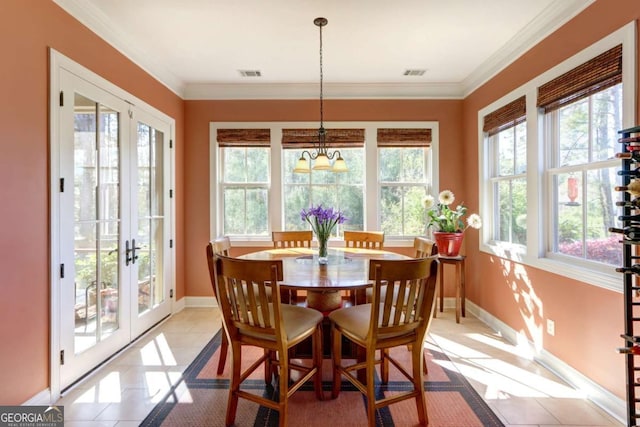 18 Enclave Cir, Savannah, GA 31419 - dining area with healthy amount of natural light, baseboards, french doors, and ornamental molding