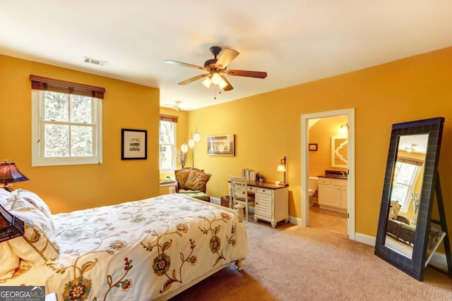 18 Enclave Cir, Savannah, GA 31419 - bedroom with light colored carpet, baseboards, ceiling fan, and connected bathroom
