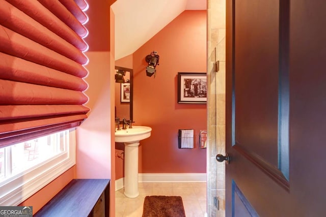 18 Enclave Cir, Savannah, GA 31419 - bathroom with tile patterned flooring, a sink, and lofted ceiling