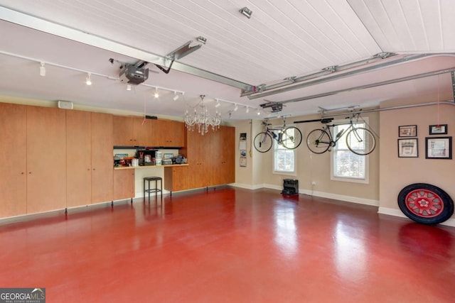 18 Enclave Cir, Savannah, GA 31419 - garage with a garage door opener and baseboards