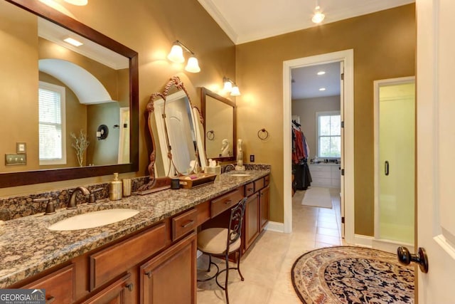 18 Enclave Cir, Savannah, GA 31419 - bathroom featuring double vanity, tile patterned flooring, crown molding, baseboards, and a spacious closet