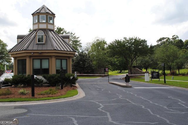 18 Enclave Cir, Savannah, GA 31419 - view of asphalt road with curbs and a gated entry