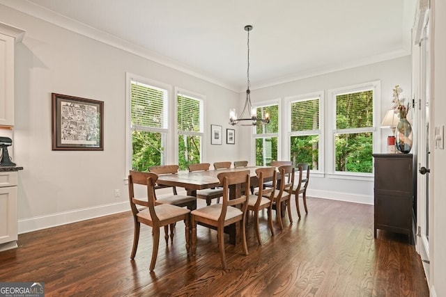 2861 Digna Ct, Acworth, GA 30101 - dining area featuring dark wood-style flooring, a chandelier, and crown molding