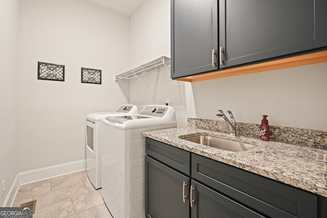 2861 Digna Ct, Acworth, GA 30101 - laundry area with washing machine and clothes dryer and cabinet space