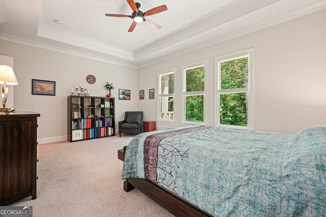 2861 Digna Ct, Acworth, GA 30101 - bedroom with ornamental molding, carpet floors, a tray ceiling, and ceiling fan