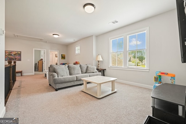 2861 Digna Ct, Acworth, GA 30101 - carpeted living room featuring attic access and baseboards