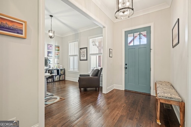 2861 Digna Ct, Acworth, GA 30101 - entrance foyer featuring a chandelier, wood finished floors, and ornamental molding