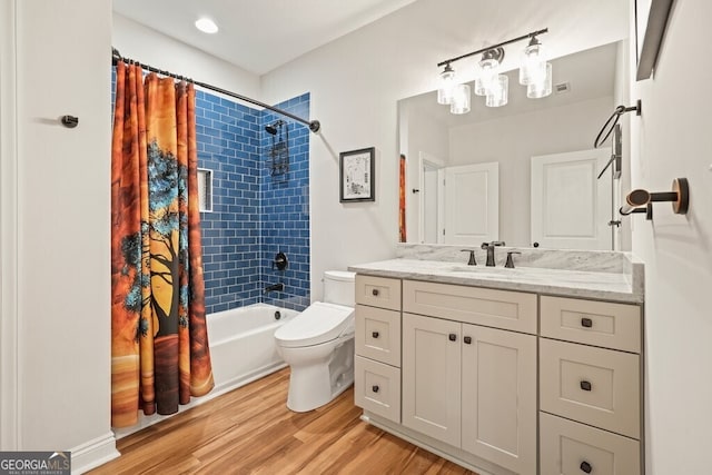 2861 Digna Ct, Acworth, GA 30101 - bathroom with vanity, wood finished floors, and shower / bathtub combination with curtain