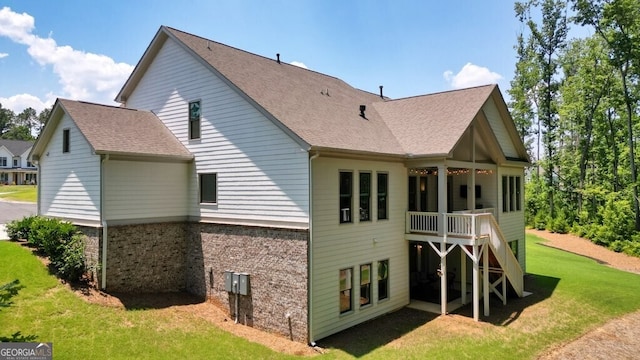 2861 Digna Ct, Acworth, GA 30101 - back of house with a lawn, a shingled roof, and brick siding