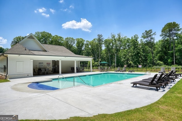2861 Digna Ct, Acworth, GA 30101 - community pool with a patio area and view of scattered trees