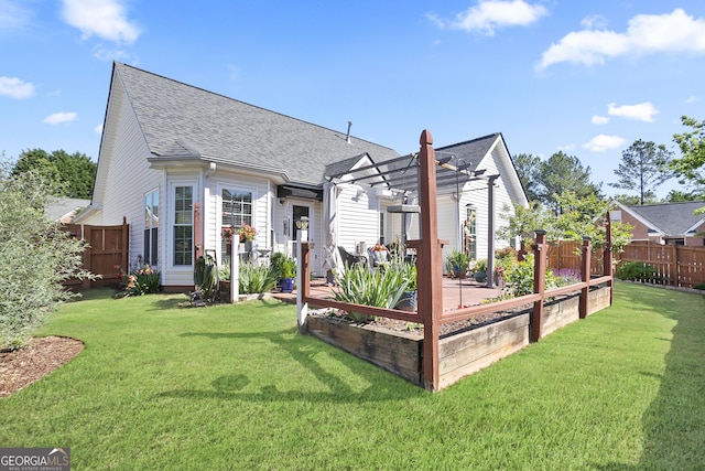 3 Bluegrass Pass, Newnan, GA 30263 - back of property with a pergola, a vegetable garden, and a shingled roof