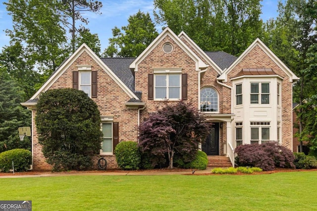 2759 Thomashire Trce, Marietta, GA 30066 - traditional-style home with a front yard and brick siding