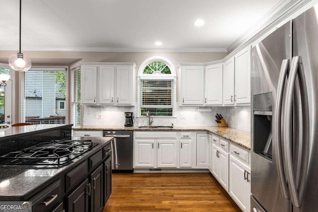 2759 Thomashire Trce, Marietta, GA 30066 - kitchen with stainless steel appliances, a sink, white cabinets, ornamental molding, and dark wood-style flooring