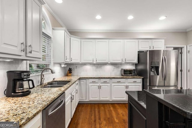 2759 Thomashire Trce, Marietta, GA 30066 - kitchen featuring stainless steel appliances, a sink, white cabinets, crown molding, and recessed lighting