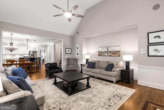 2759 Thomashire Trce, Marietta, GA 30066 - living area featuring a ceiling fan, dark wood-style floors, high vaulted ceiling, and a chandelier