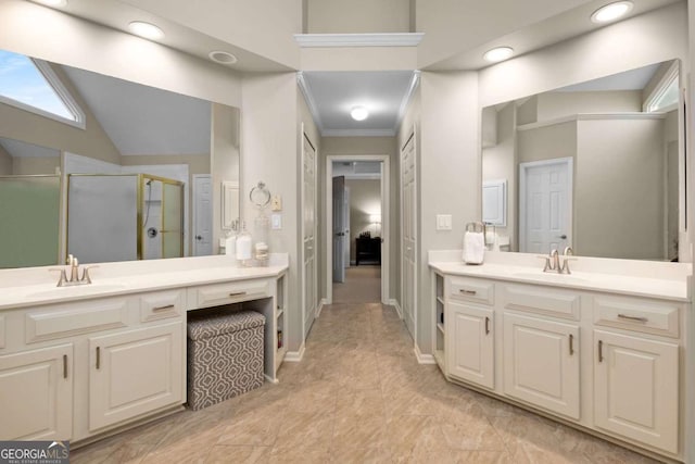 2759 Thomashire Trce, Marietta, GA 30066 - bathroom with a shower stall, crown molding, two vanities, baseboards, and recessed lighting