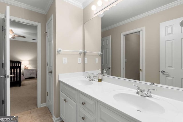 2759 Thomashire Trce, Marietta, GA 30066 - bathroom featuring double vanity, ceiling fan, tile patterned flooring, crown molding, and baseboards