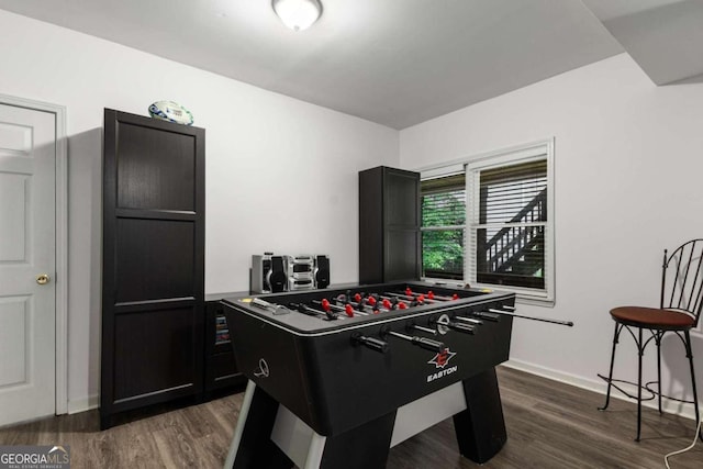 2759 Thomashire Trce, Marietta, GA 30066 - rec room with dark wood-style flooring and baseboards
