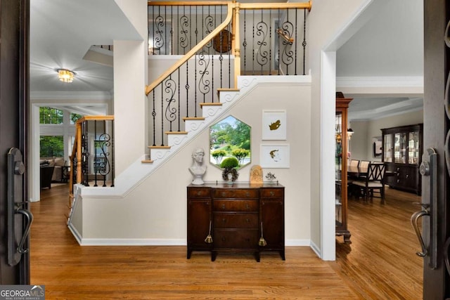 2759 Thomashire Trce, Marietta, GA 30066 - entryway featuring wood finished floors, stairs, baseboards, and ornamental molding