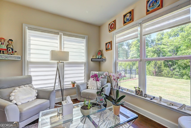 778 Firefly Ct, Griffin, GA 30223 - sitting room with baseboards and wood finished floors