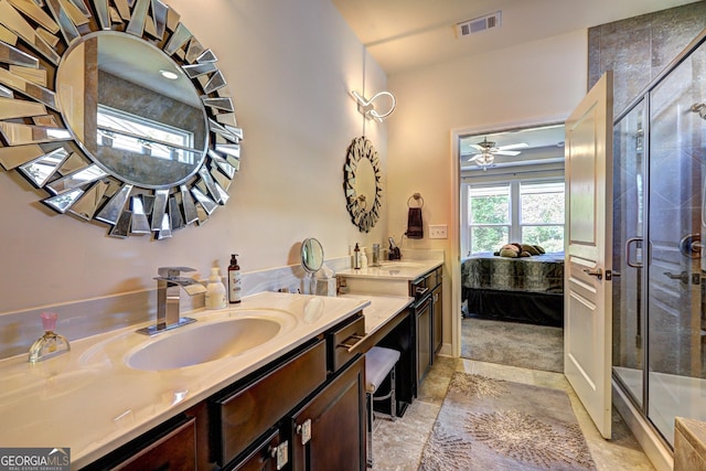 778 Firefly Ct, Griffin, GA 30223 - bathroom featuring connected bathroom, vanity, a stall shower, and a ceiling fan
