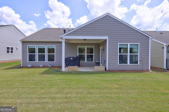 778 Firefly Ct, Griffin, GA 30223 - back of property with a patio and a yard