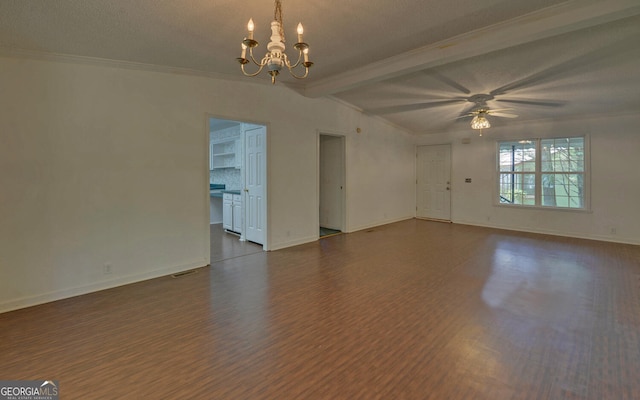 spare room featuring dark wood finished floors, a chandelier, ornamental molding, baseboards, and a ceiling fan