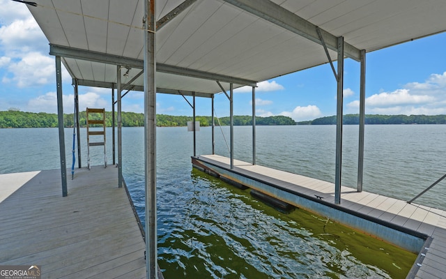 dock with a water view and boat lift