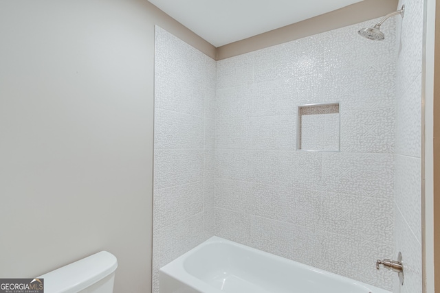 full bath featuring toilet and shower / tub combination