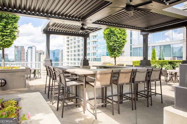 855 Peachtree St NE Unit 2203, Atlanta, GA 30308 - view of patio / terrace with a city view and a ceiling fan