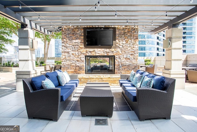 855 Peachtree St NE Unit 2203, Atlanta, GA 30308 - view of patio / terrace with an outdoor living space with a fireplace, a pergola, and grilling area