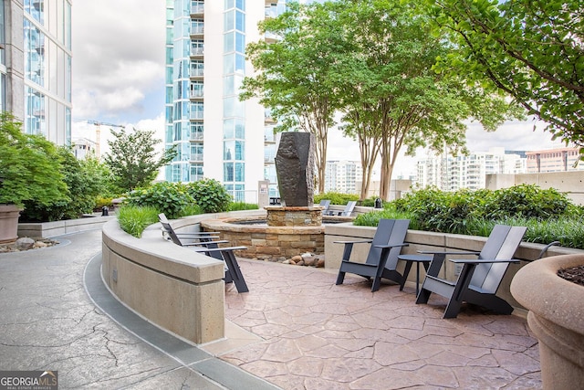 855 Peachtree St NE Unit 2203, Atlanta, GA 30308 - view of home's community featuring a patio and a city view