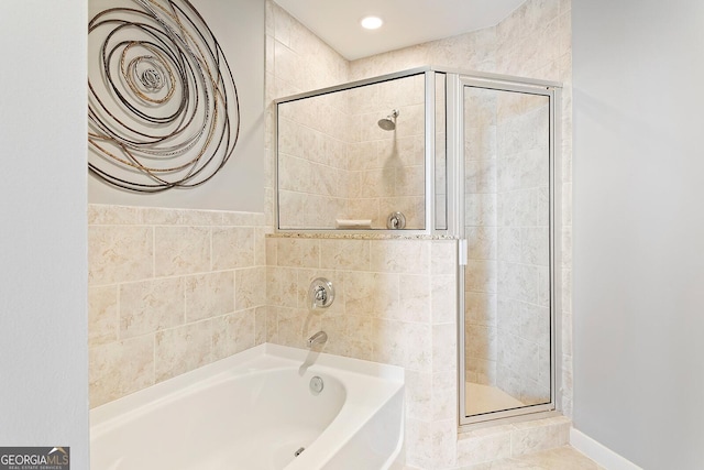 855 Peachtree St NE Unit 2203, Atlanta, GA 30308 - bathroom with a shower stall and a garden tub