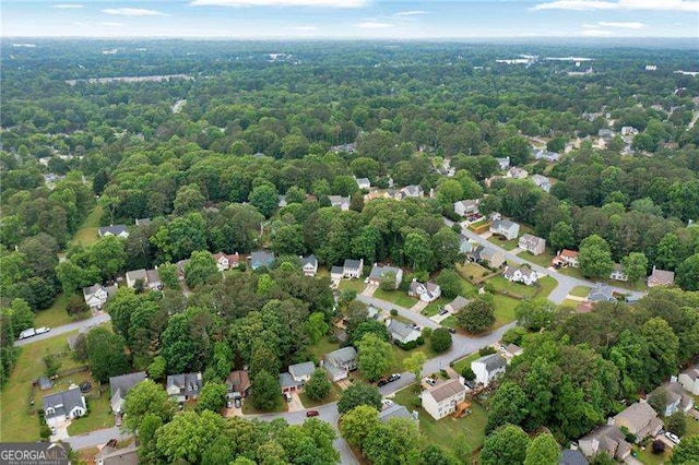 aerial overview of property's location with nearby suburban area