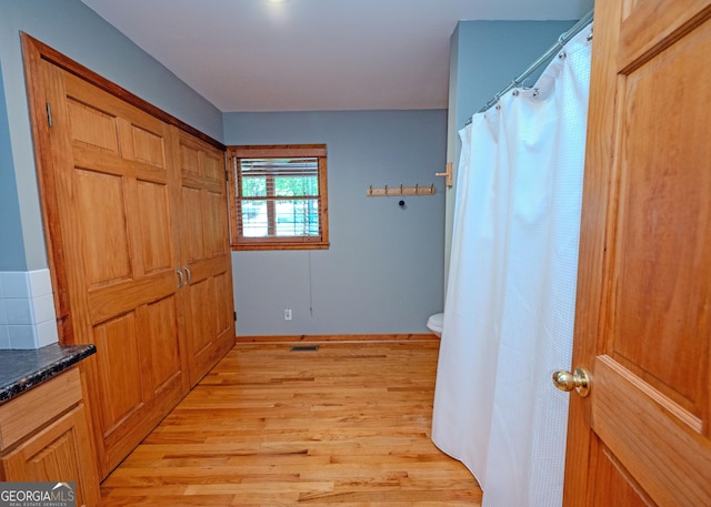 142 Hugh Dorsey Rd, Hartwell, GA 30643 - corridor featuring light wood-style flooring and baseboards