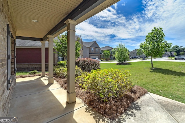 view of patio / terrace with a residential view