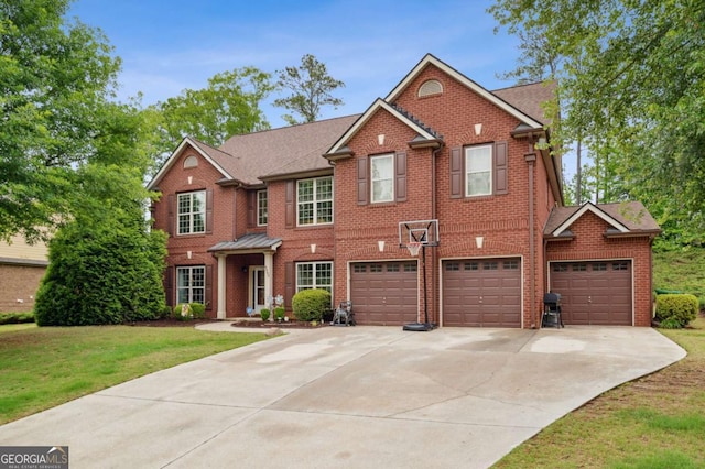 4960 Tadmore Ln, Lithonia, GA 30038 - georgian-style home with concrete driveway, brick siding, a front lawn, and an attached garage