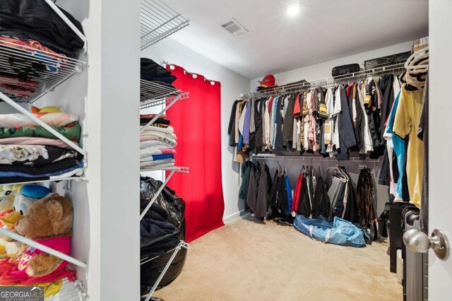4960 Tadmore Ln, Lithonia, GA 30038 - spacious closet featuring carpet flooring
